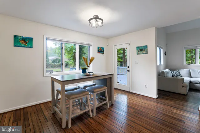 a kitchen with stainless steel appliances a refrigerator stove microwave and cabinets