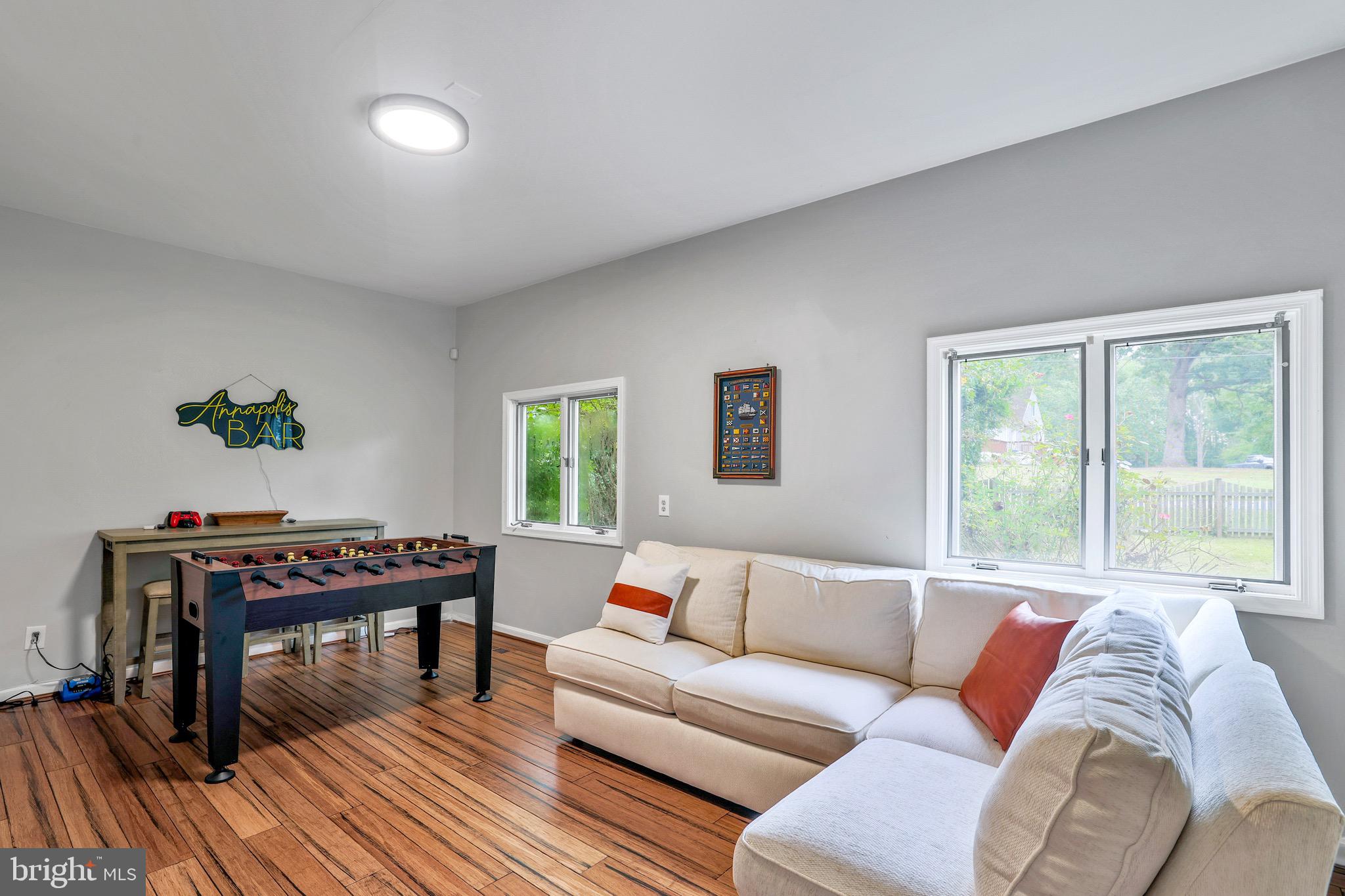 920 Old Annapolis Neck Road Annapolis, MD 21403 - Photo 6 of 58 a living room with furniture and a wooden floor