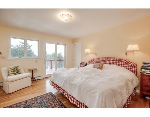 67 Westminster Road Princeton, MA 01541 - Photo 23 of 29 a bedroom with a large bed and a couch