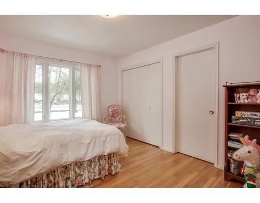 67 Westminster Road Princeton, MA 01541 - Photo 26 of 29 a bedroom with a bed and a book shelf