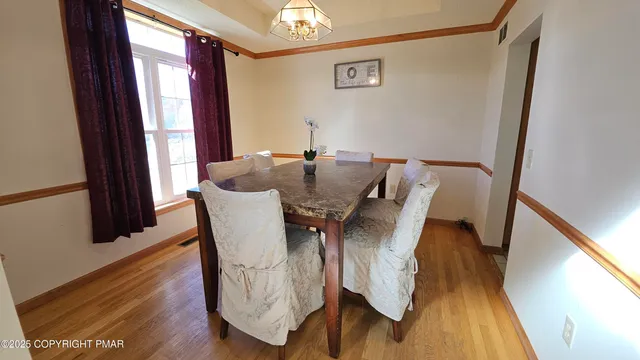 a backyard of a house with lots of green space and sink