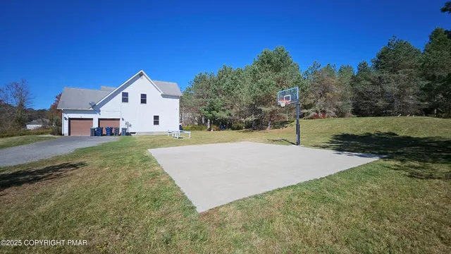 a bedroom with a bed and a mirror