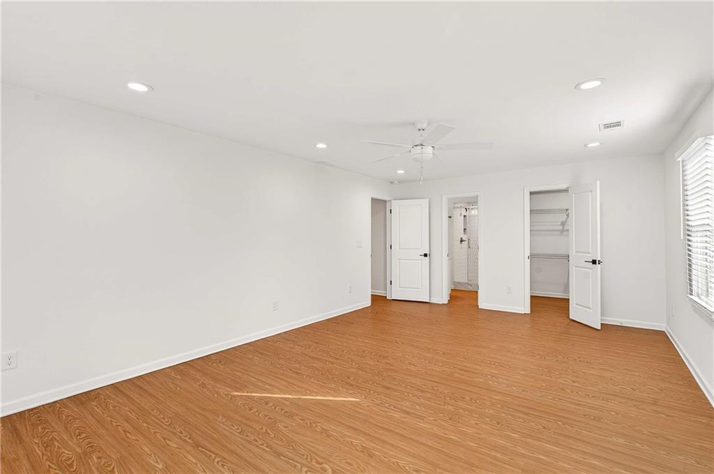 1028 Boston Ridge Woodstock, GA 30189 - Photo 20 of 37 a view of an empty room with wooden floor
