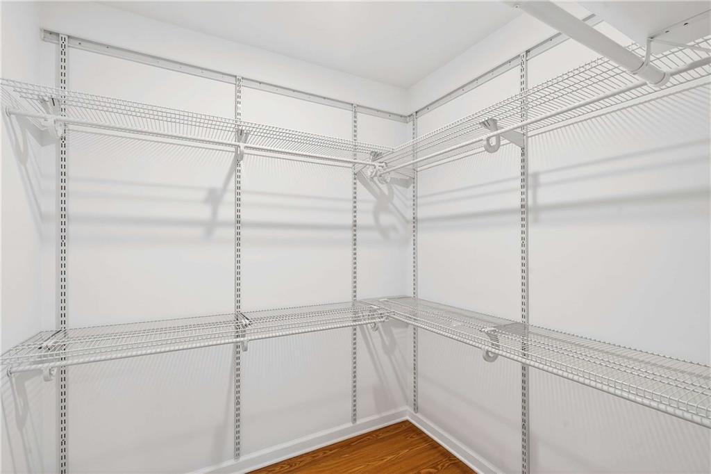 1028 Boston Ridge Woodstock, GA 30189 - Photo 21 of 37 a view of a room with racks on the wall