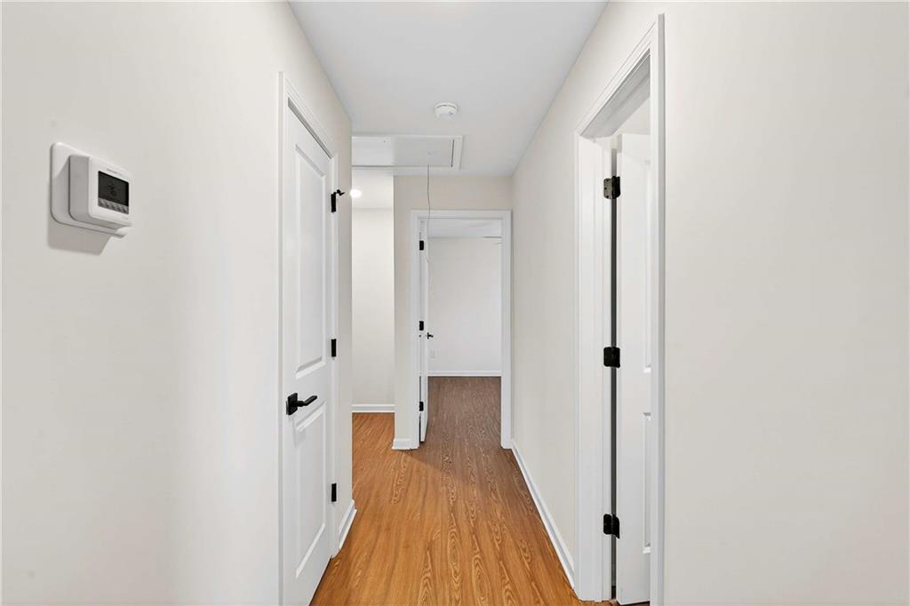 1028 Boston Ridge Woodstock, GA 30189 - Photo 24 of 37 a view of a room with wooden floor