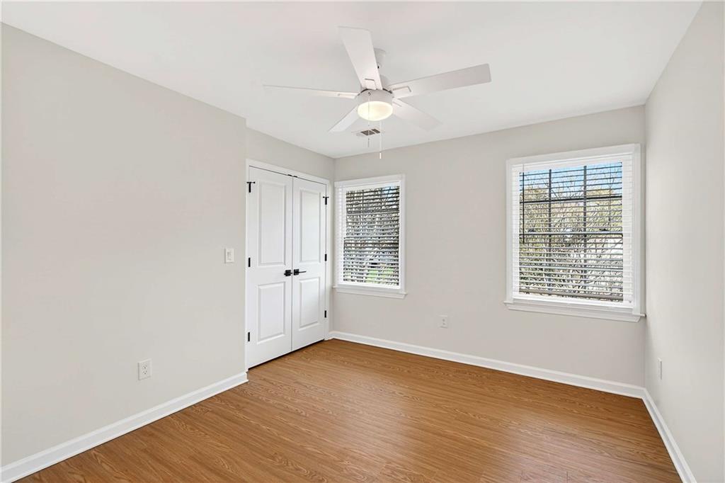 1028 Boston Ridge Woodstock, GA 30189 - Photo 28 of 37 wooden floor in an empty room with a window