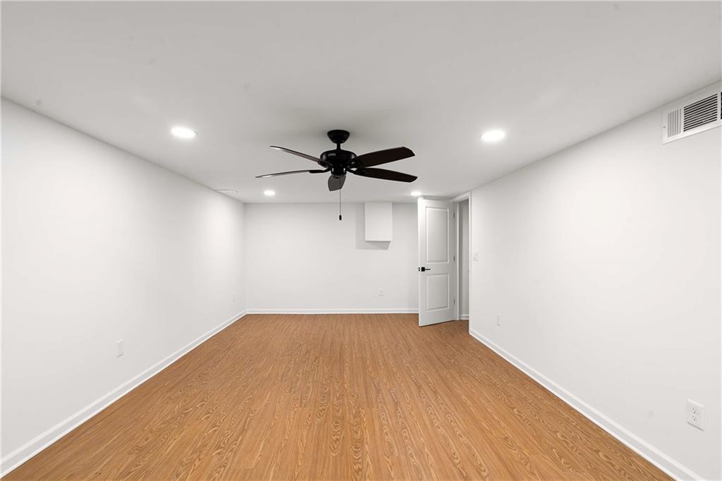 1028 Boston Ridge Woodstock, GA 30189 - Photo 32 of 37 a view of empty room with wooden floor