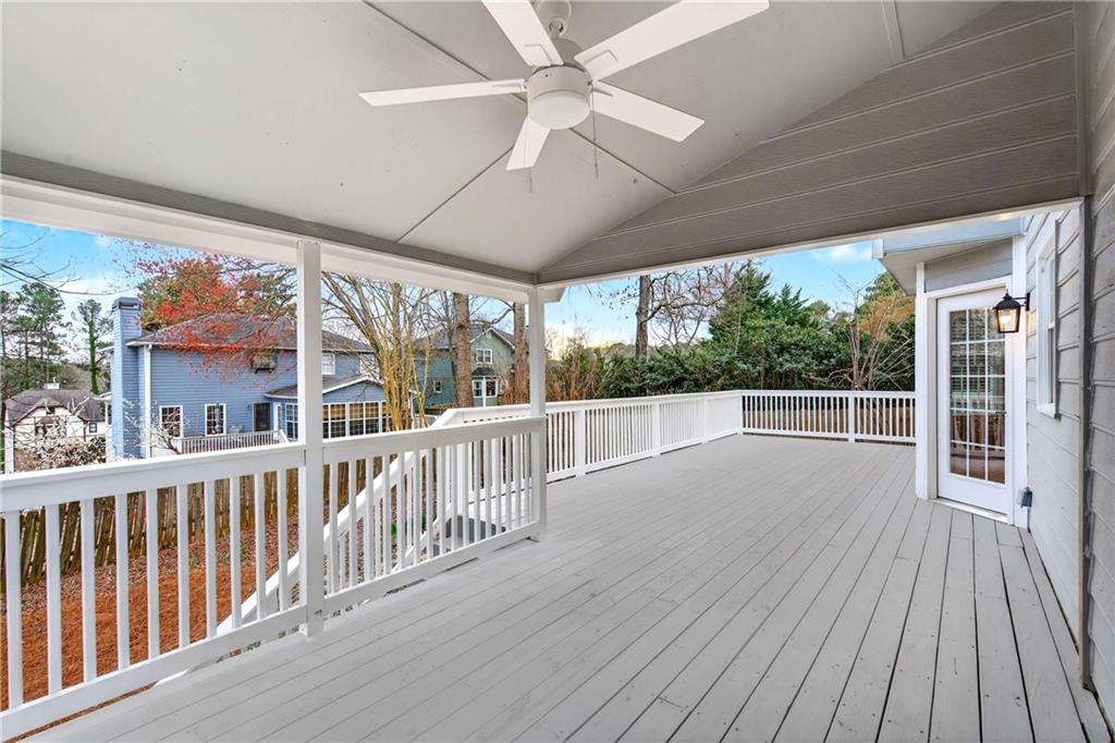 1028 Boston Ridge Woodstock, GA 30189 - Photo 34 of 37 a view of a house with porch and wooden floor