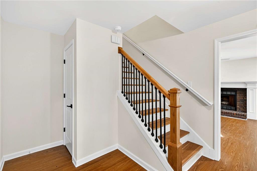 1028 Boston Ridge Woodstock, GA 30189 - Photo 4 of 37 a view of entryway with wooden floor