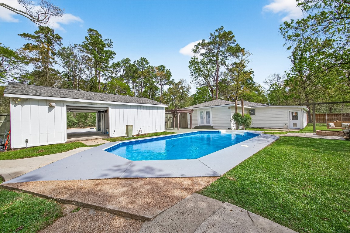 1619 Ashway Street Conroe, TX 77385 - Photo 1 of 40 The perfect back yard for entertaining just in time for summer.