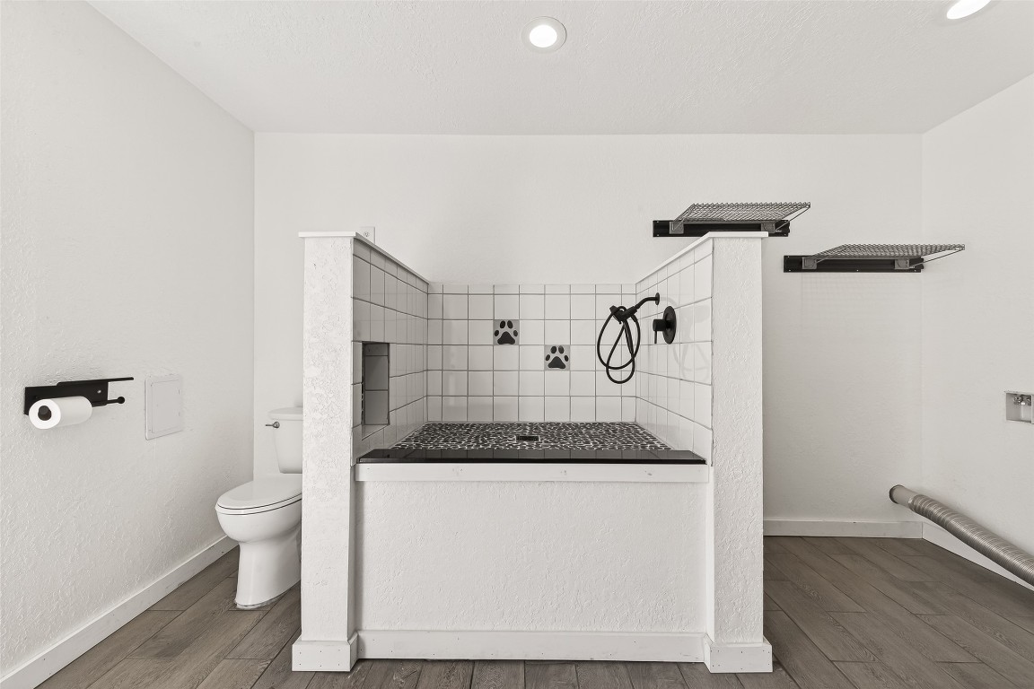 1619 Ashway Street Conroe, TX 77385 - Photo 26 of 40 Dog lovers this is your sign! The Laundry room comes equipped with a dog shower.