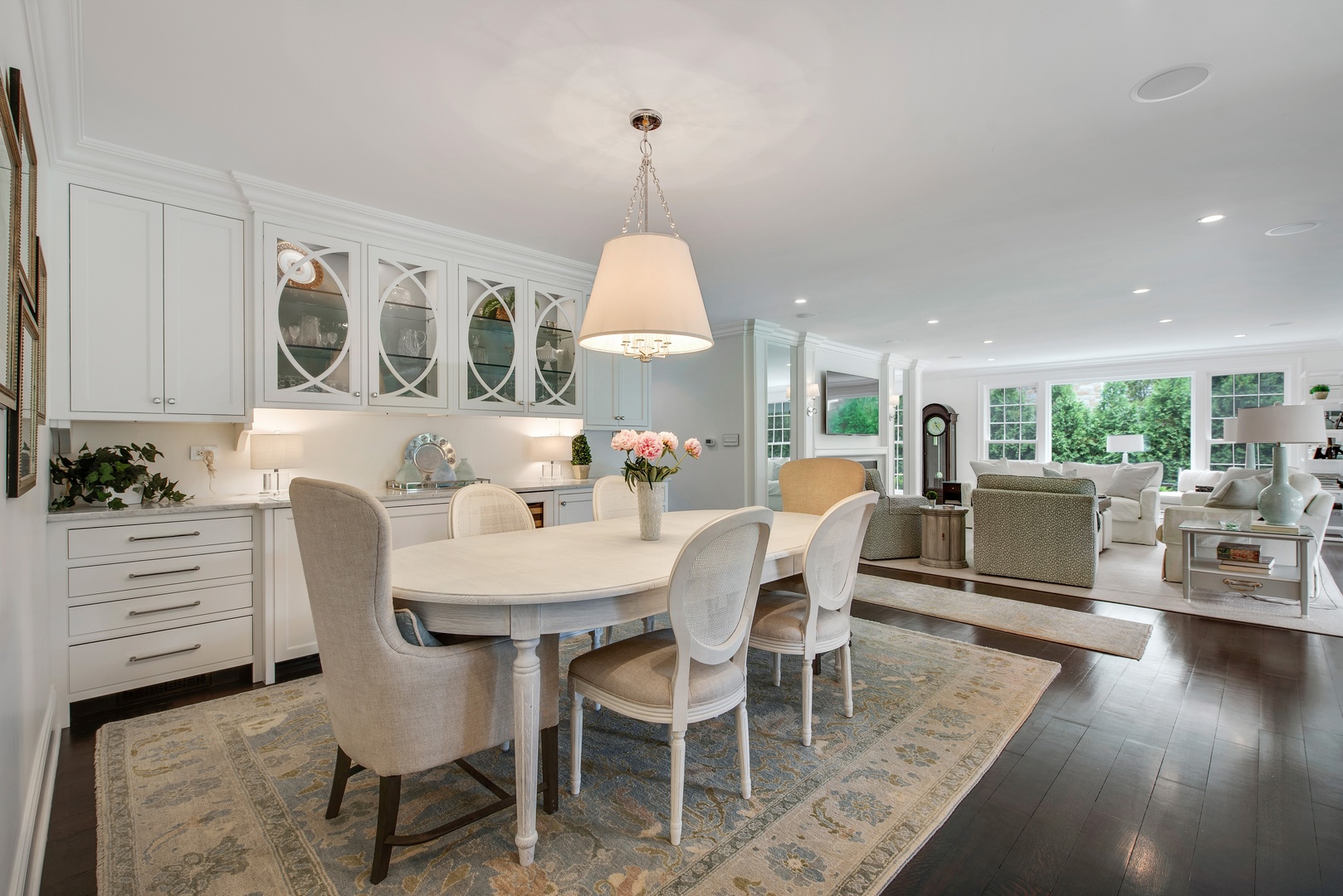 36 Hibbard Road Winnetka, IL 60093 - Photo 11 of 31 a dining room with furniture a chandelier and wooden floor