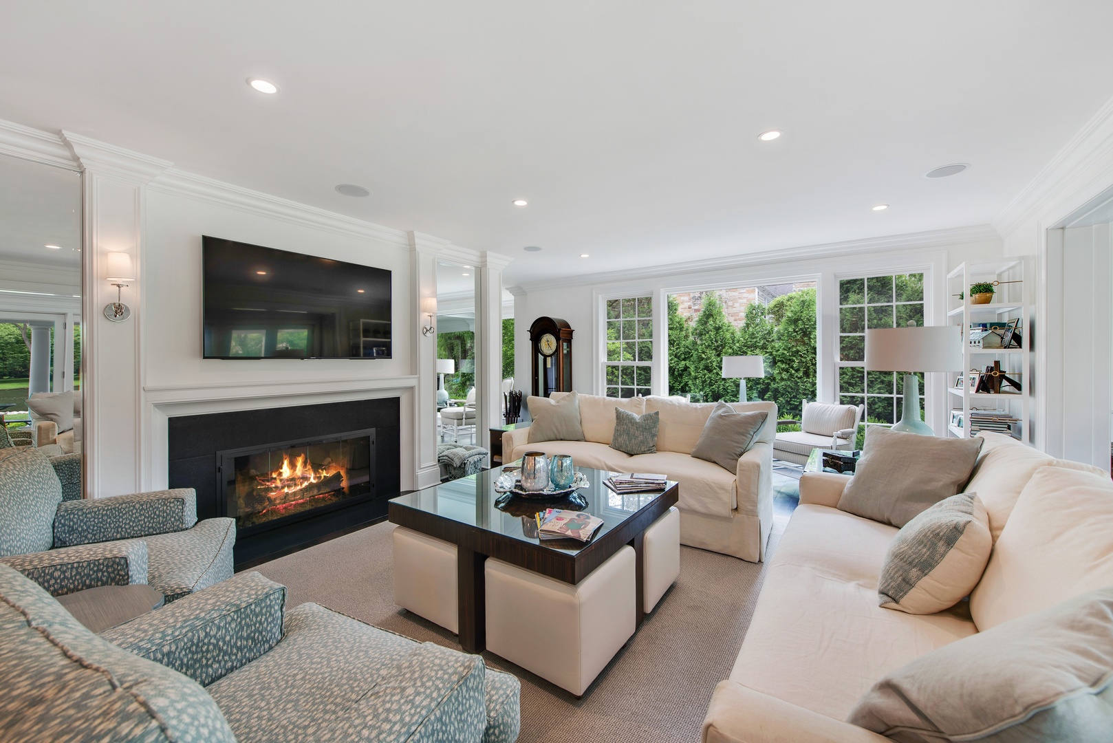36 Hibbard Road Winnetka, IL 60093 - Photo 6 of 31 a living room with furniture fireplace and flat screen tv