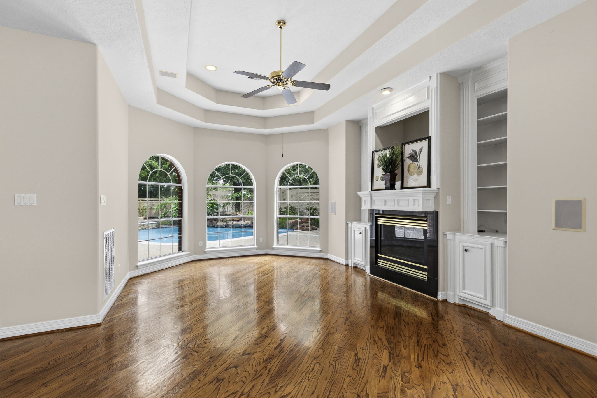 18310 Pamela Way Spring, TX 77379 - Photo 17 of 42 Stunning architectural details featuring expansive, unobstructed views of the beautifully landscaped backyard and private swimming pool.