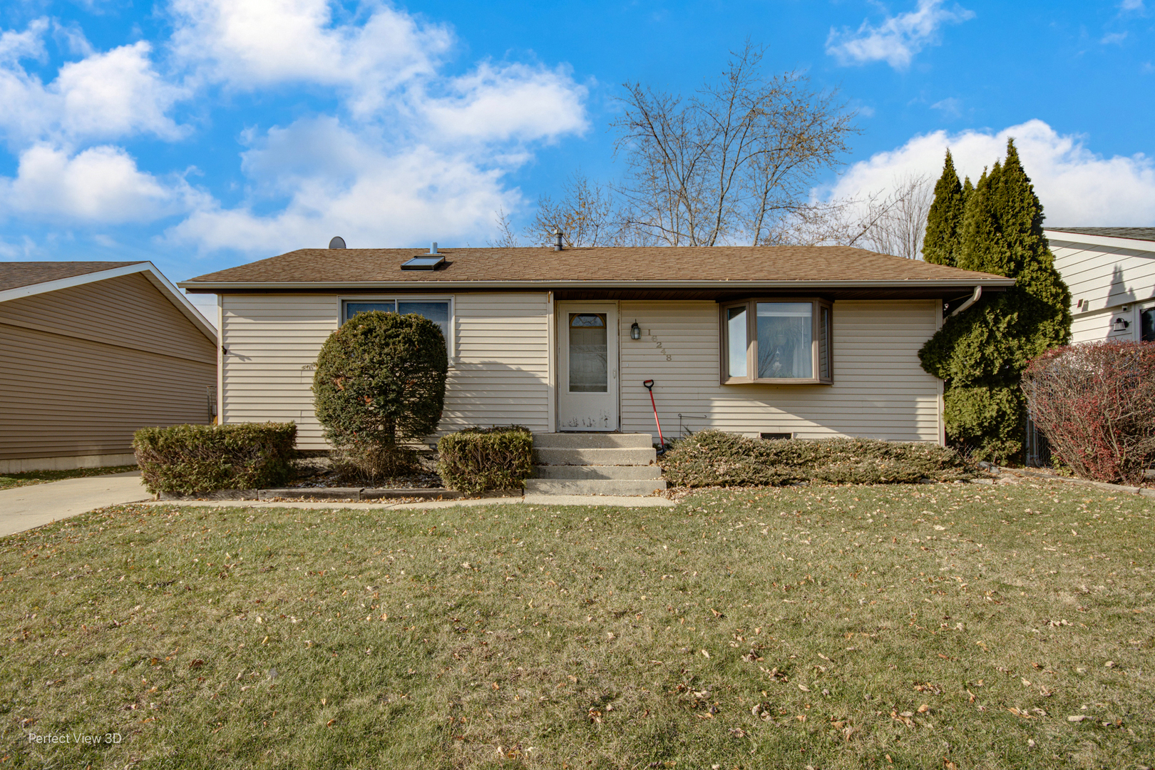 16248 Haven Avenue Orland Hills, IL 60487 - Photo 1 of 10 a front view of a house with garden