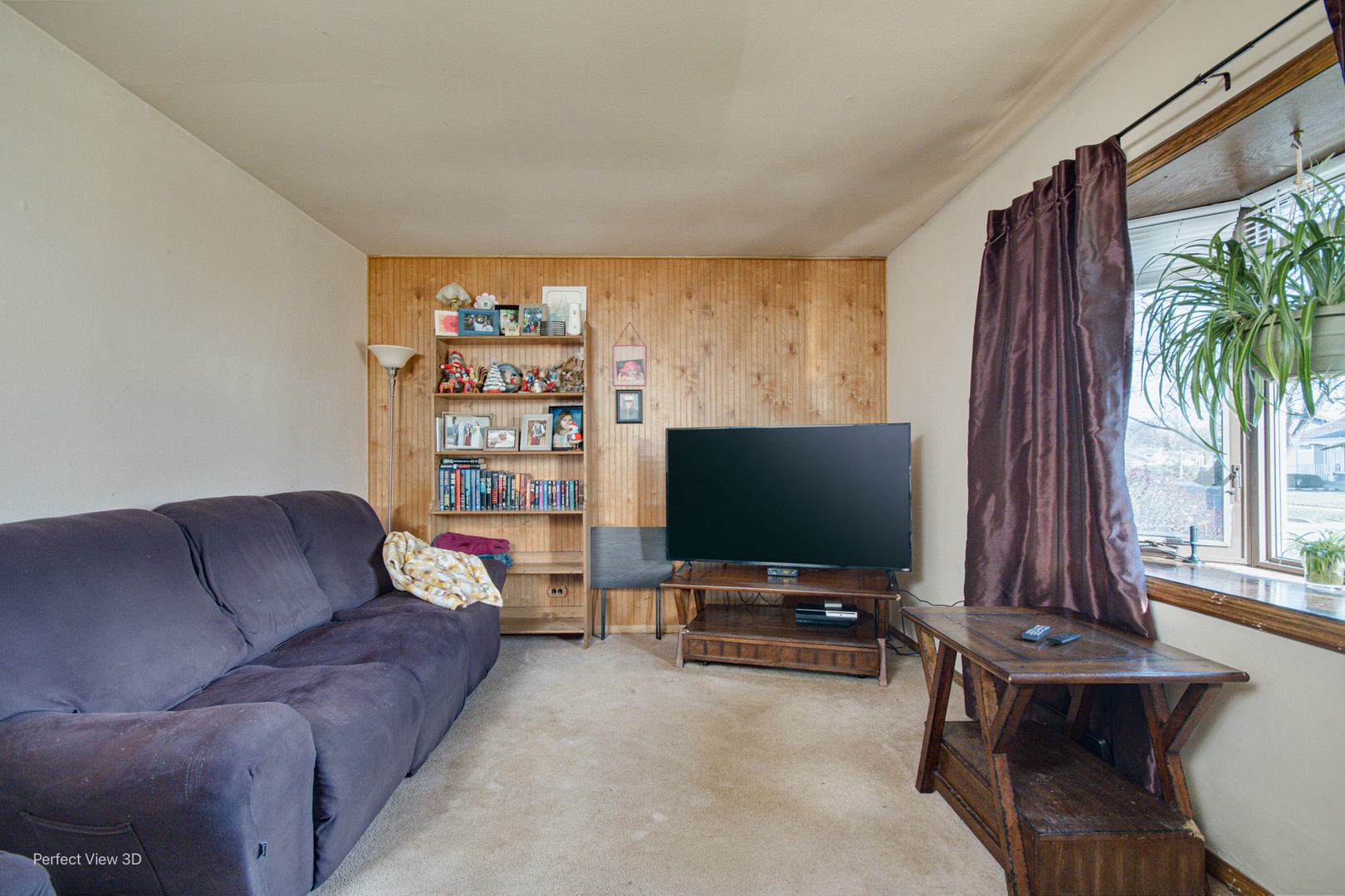 16248 Haven Avenue Orland Hills, IL 60487 - Photo 5 of 10 a living room with furniture and a flat screen tv