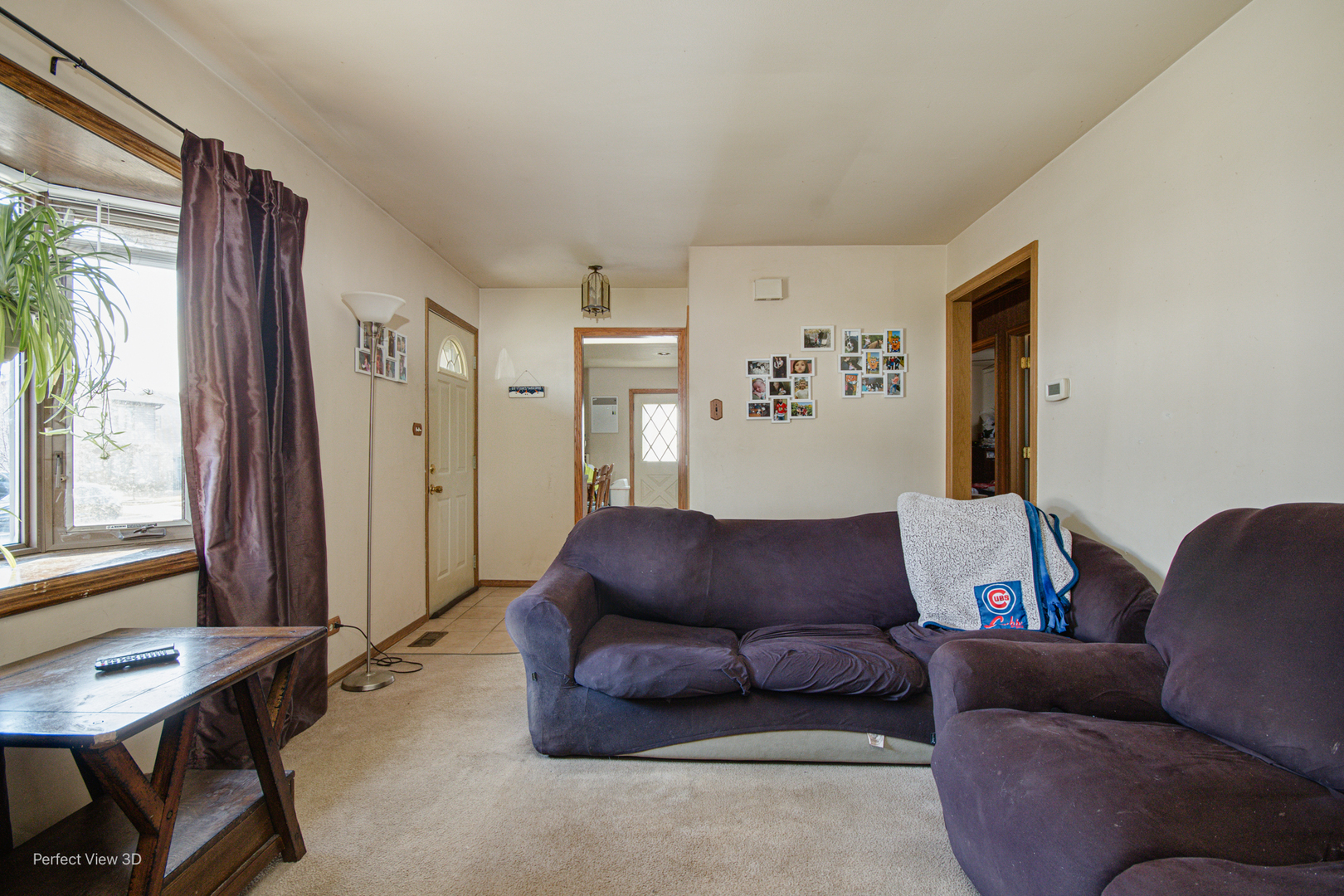16248 Haven Avenue Orland Hills, IL 60487 - Photo 7 of 10 a living room with furniture and a window