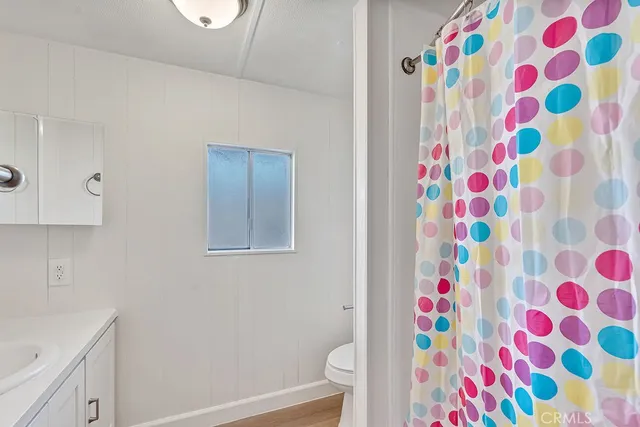 a bathroom with a bathtub and a sink