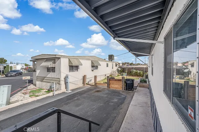a flower plants in front of a house