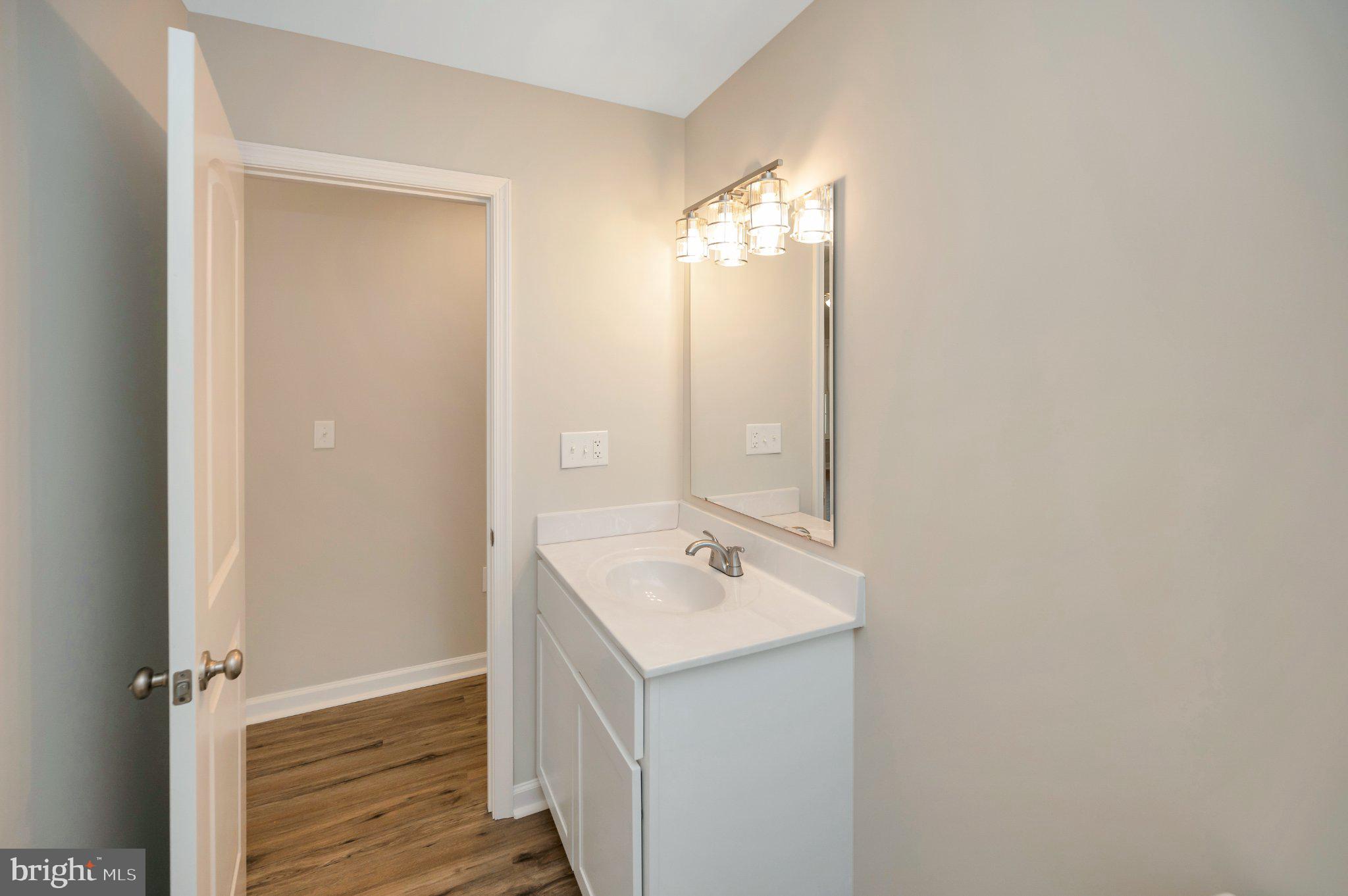 28150 Tatum Road Unionville, VA 22567 - Photo 25 of 28 Modern bathroom with sleek finishes.
