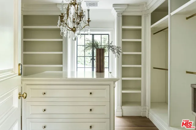 a view of a chairs and table in the patio