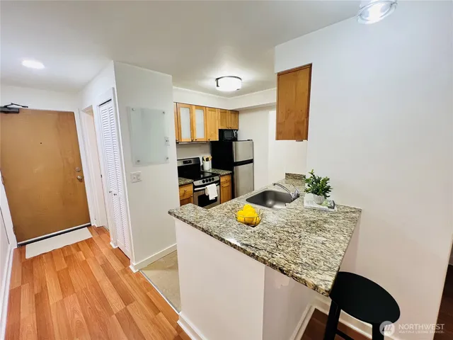 a view of kitchen island dining table and chairs