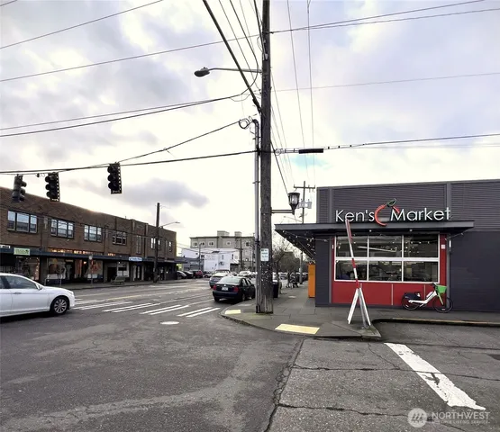 a view of street with parked cars