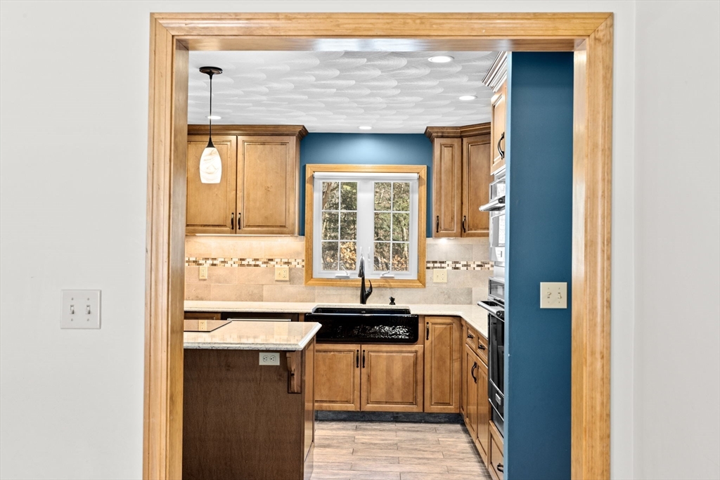 4 Highland Ridge Road Assonet, MA 02702 - Photo 14 of 42 a kitchen with a sink and a window