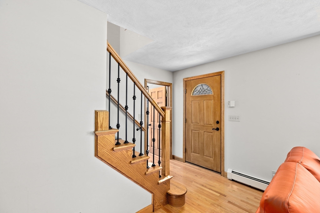 4 Highland Ridge Road Assonet, MA 02702 - Photo 23 of 42 a view of an entryway with wooden floor