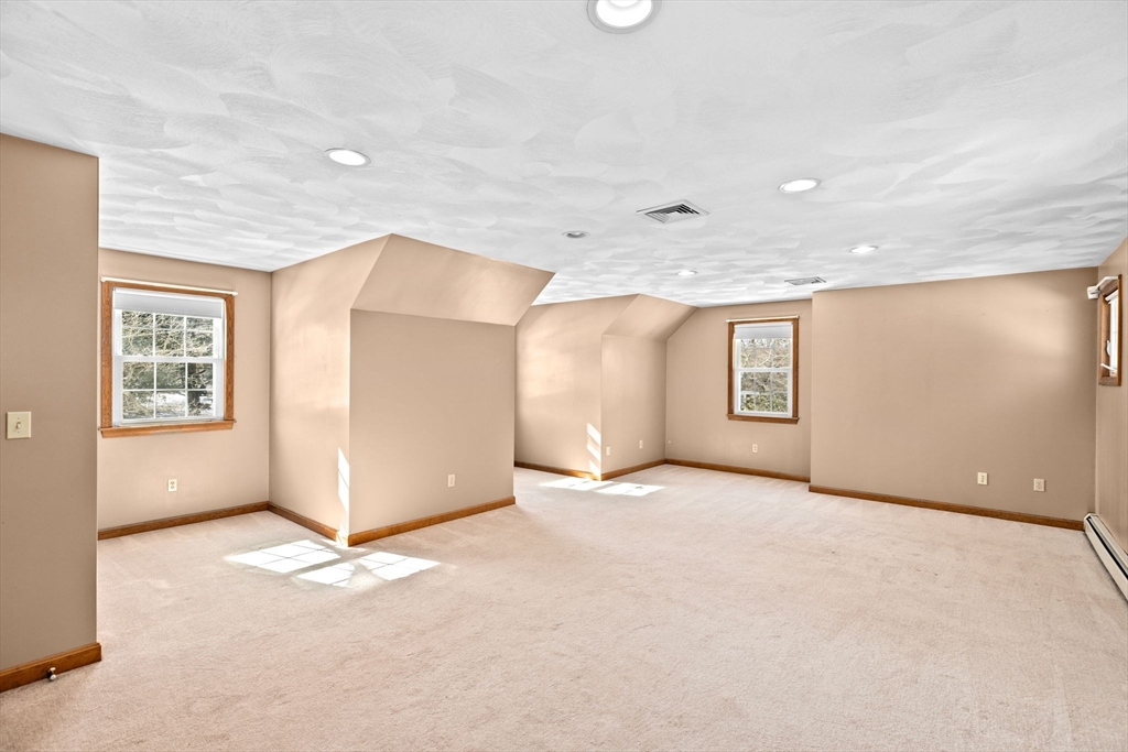 4 Highland Ridge Road Assonet, MA 02702 - Photo 24 of 42 an empty room with windows and refrigerator