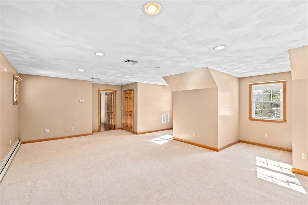 4 Highland Ridge Road Assonet, MA 02702 - Photo 25 of 42 a view of an empty room with a window