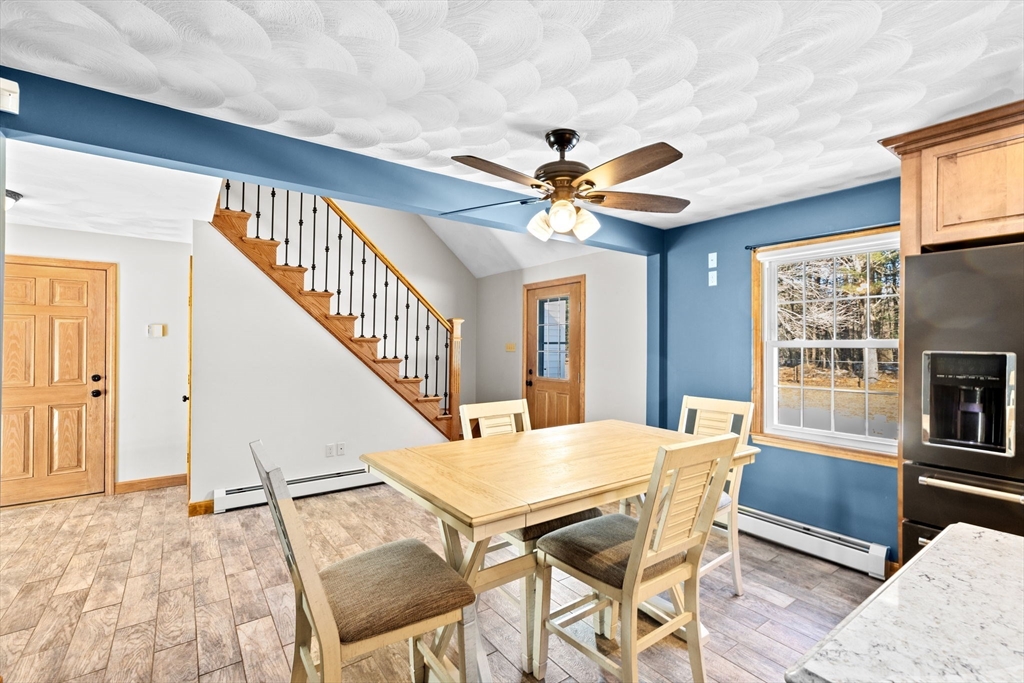 4 Highland Ridge Road Assonet, MA 02702 - Photo 3 of 42 a view of a dining room with furniture window and wooden floor