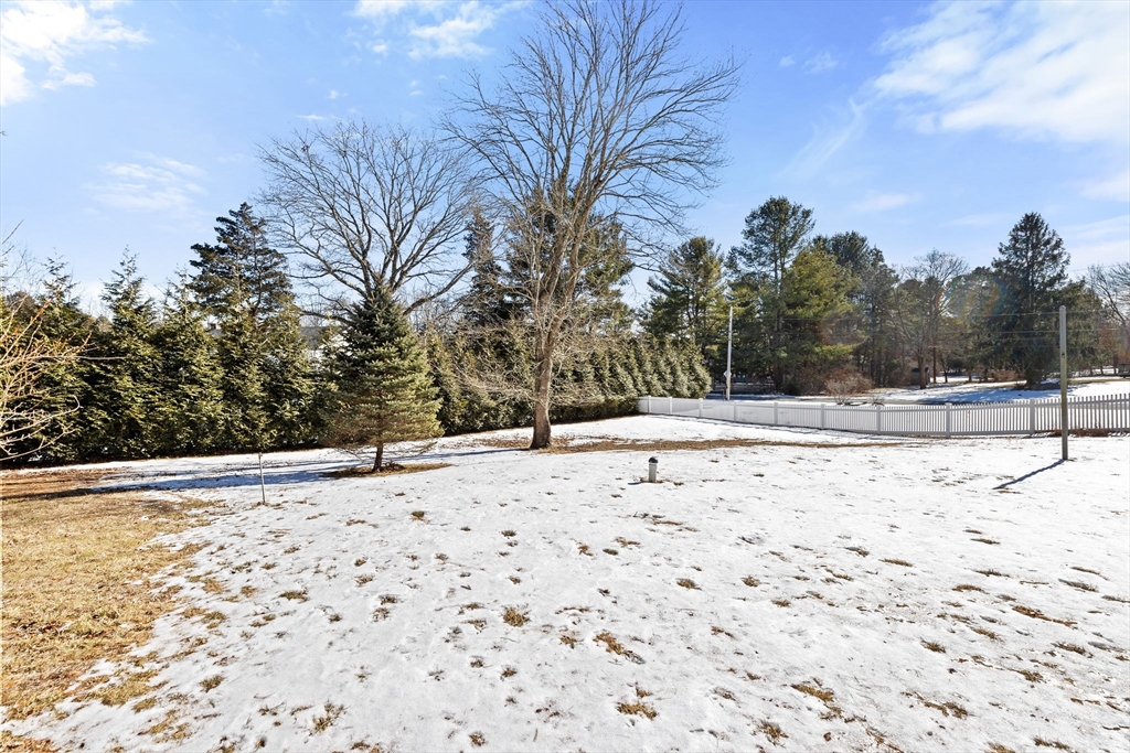 4 Highland Ridge Road Assonet, MA 02702 - Photo 39 of 42 a view of a yard covered with snow