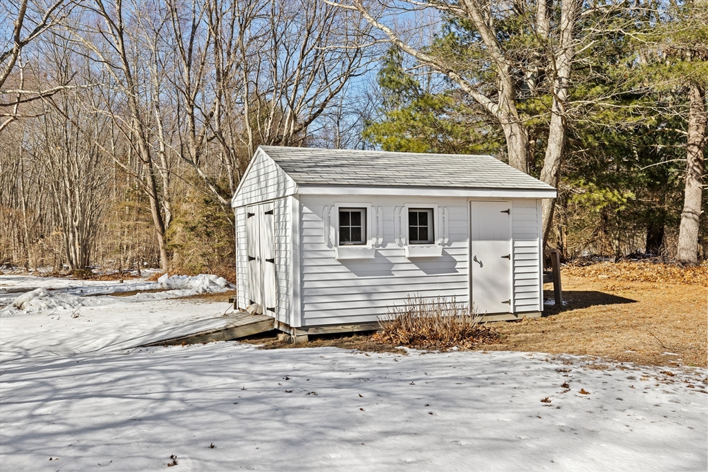 4 Highland Ridge Road Assonet, MA 02702 - Photo 40 of 42 a front view of a house with a yard