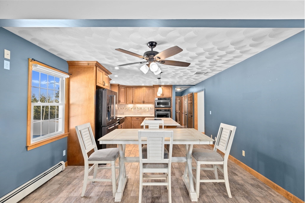 4 Highland Ridge Road Assonet, MA 02702 - Photo 6 of 42 a view of a dining room with furniture window and outside view