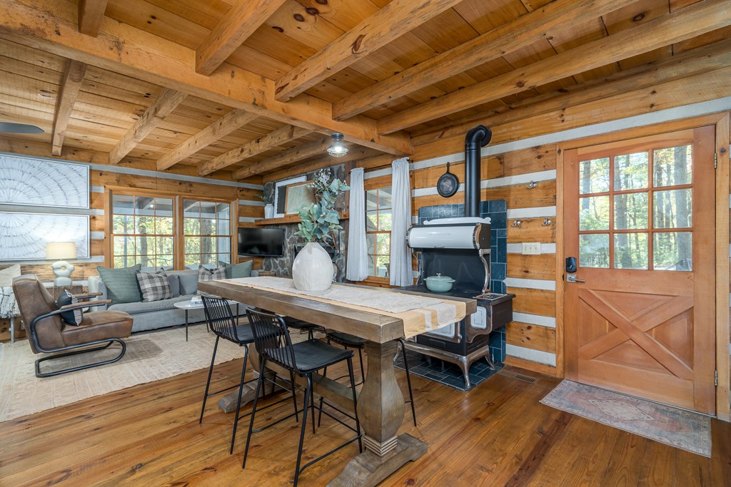 250 Chinkapin Drive Blue Ridge, GA 30513 - Photo 20 of 50 a view of a dining room with furniture window and wooden floor