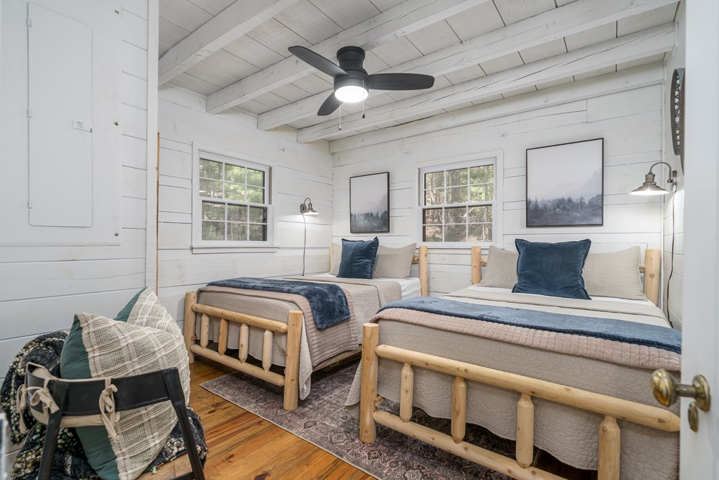 250 Chinkapin Drive Blue Ridge, GA 30513 - Photo 32 of 50 a spacious bedroom with a bed and window