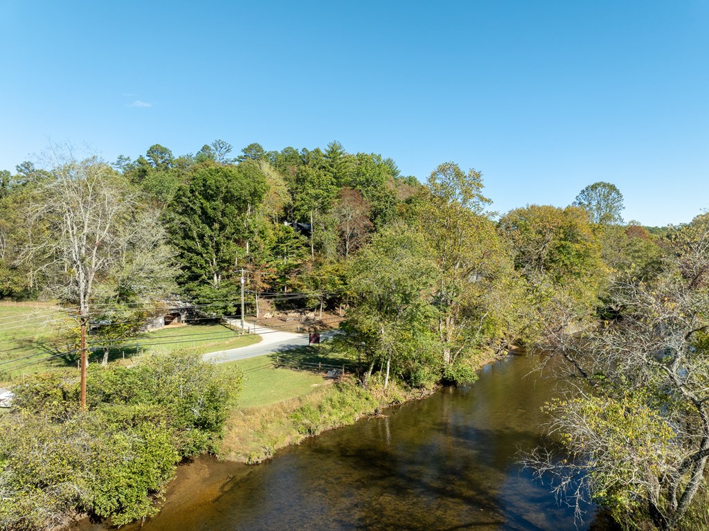 250 Chinkapin Drive Blue Ridge, GA 30513 - Photo 47 of 50 a view of a lake with a yard