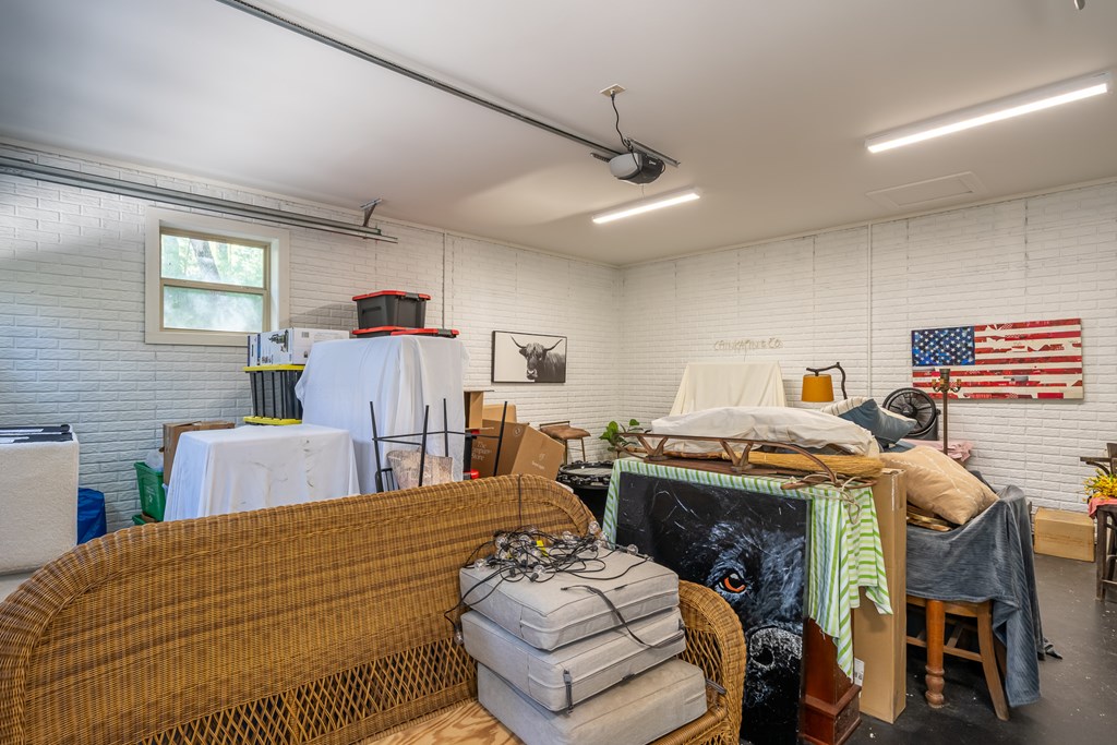 250 Chinkapin Drive Blue Ridge, GA 30513 - Photo 48 of 50 a bedroom with a bed and wooden floor