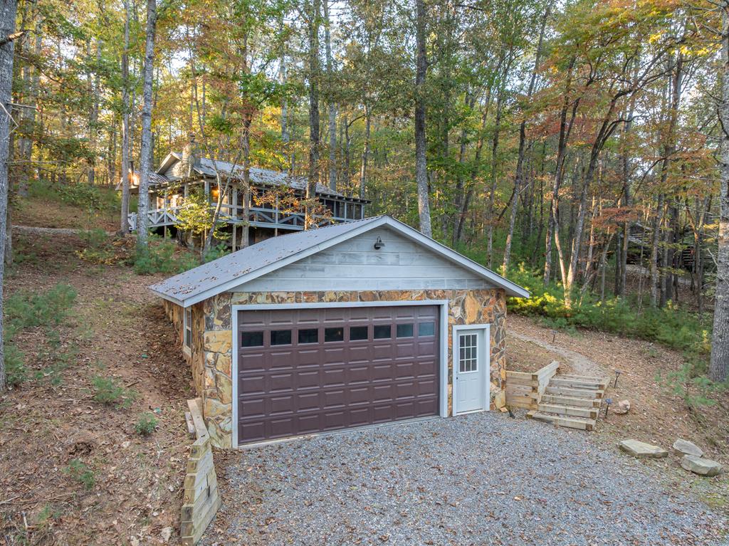 250 Chinkapin Drive Blue Ridge, GA 30513 - Photo 50 of 50 a front view of a house with garden