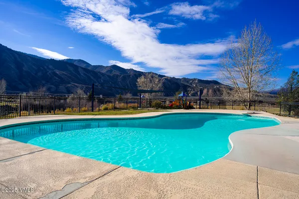 a view of a swimming pool and a terrace