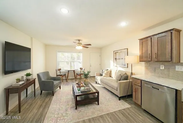 a bedroom with a large bed and furniture