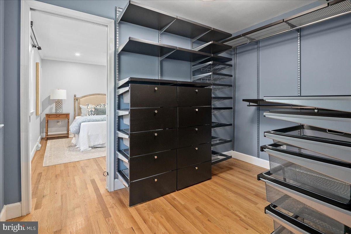 9515 Stevebrook Road Fairfax, VA 22032 - Photo 11 of 25 a room with a bed and a cabinets