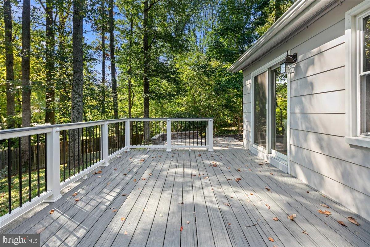 9515 Stevebrook Road Fairfax, VA 22032 - Photo 22 of 25 a view of backyard with a deck and wooden floor