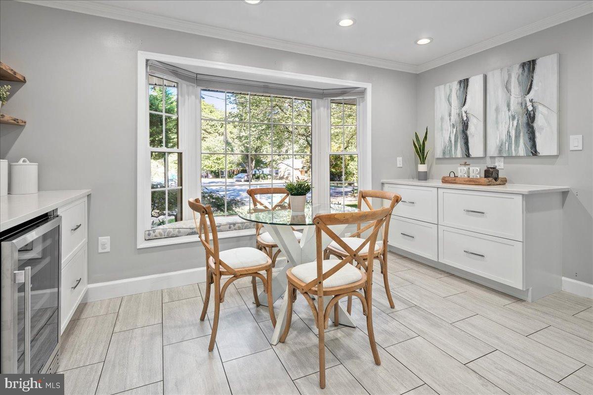9515 Stevebrook Road Fairfax, VA 22032 - Photo 7 of 25 a view of a dining room with furniture window and outside view