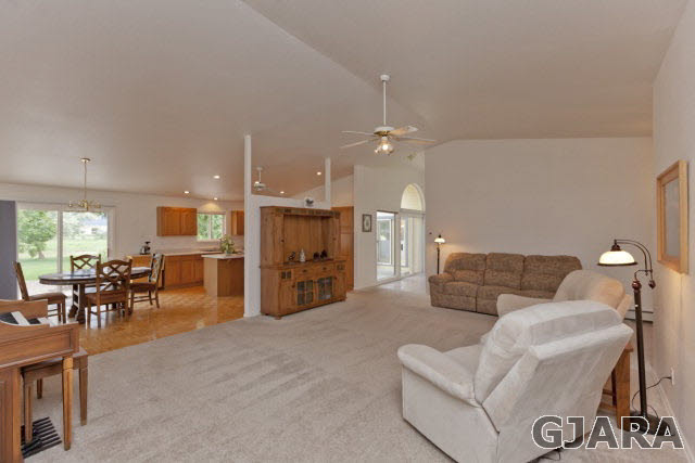 2391 H Road Grand Junction, CO 81505 - Photo 7 of 33 a living room with furniture and kitchen view