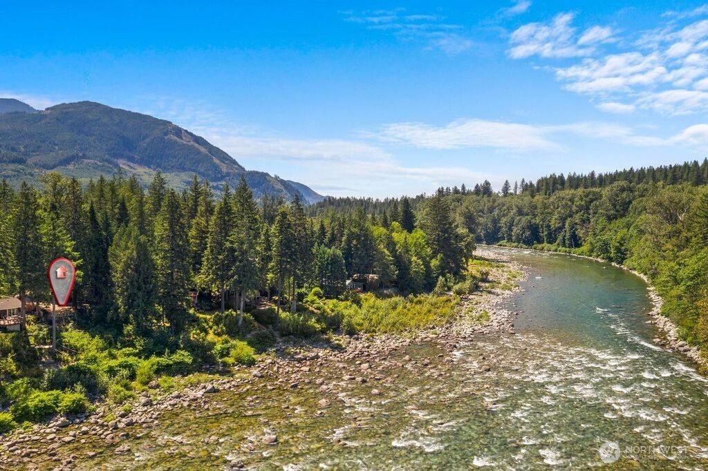 44725 Fir Road Gold Bar, WA 98251 - Photo 13 of 17 a view of a lake with a mountain in the background