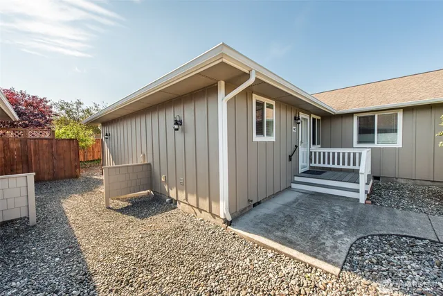 a view of a backyard with a potted plant