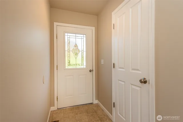 a view of a bathroom from a hallway