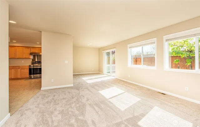 a view of a kitchen with washer and dryer